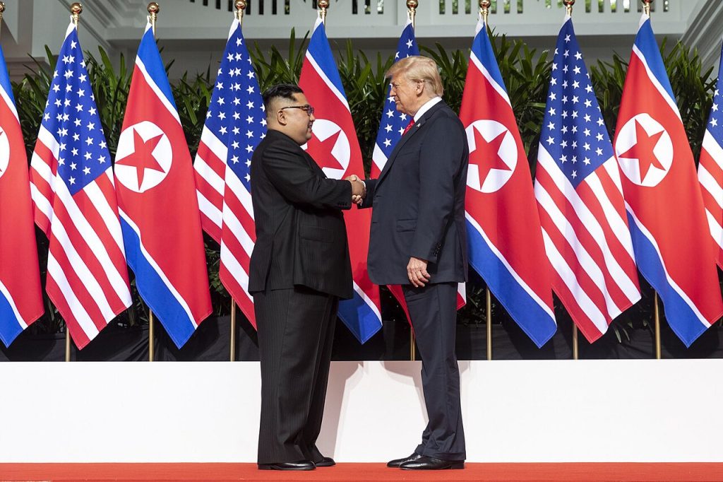 Kim and U.S. President Donald Trump shake hands at the start of the 2018 North Korea–United States Summit, June 2018